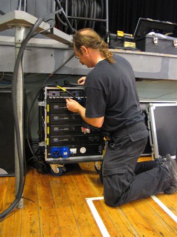 Tony connecting the amp-rack at Painswick Blues, 2005
